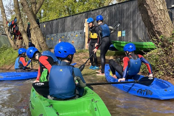children kayaking
